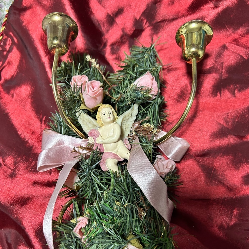 Beautiful vintage Victorian Candle sconce decorated with an angel- and greenery